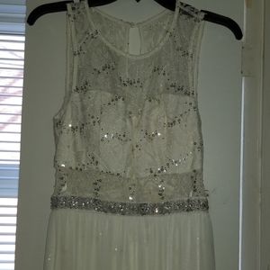White sequin lace mini dress with sheer cover